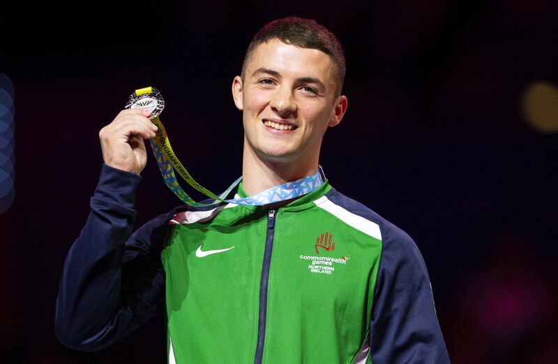 Northern Ireland’s Rhys McClenaghan celebrates with his silver medal after the men's pommel horse final at the Commonwealth Games in Birmingham. Photograph: Ewan Bootman/Inpho