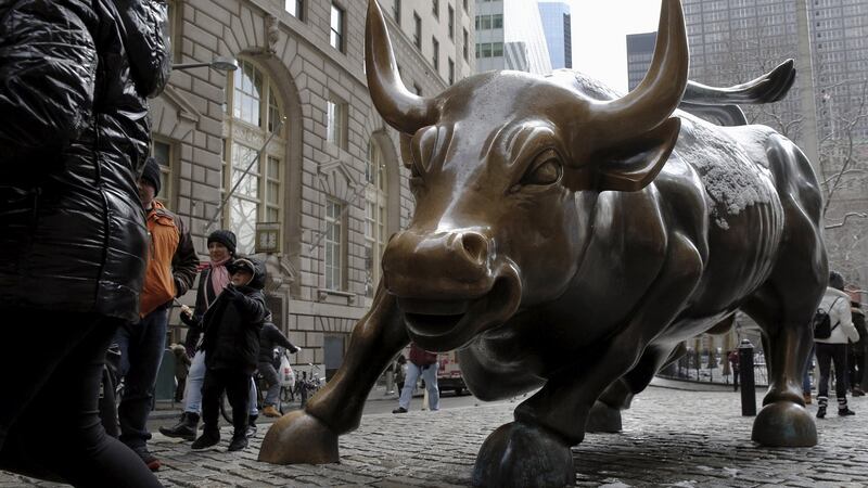 A bronze “Charging Bull” statue is seen in New York’s financial district: Stocks typically remain in long trading ranges for specific fundamental reasons. Photograph:  REUTERS/Brendan McDermid