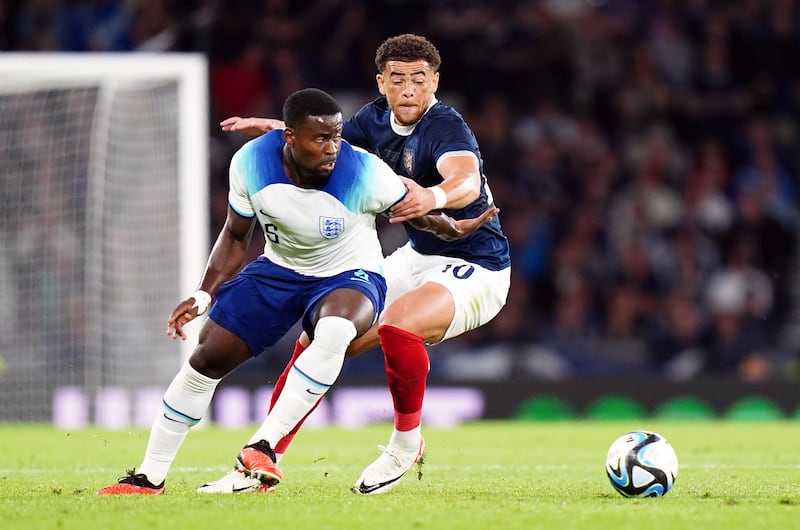 Scotland's Che Adams and England's Marc Guehi during an  international friendly at Hampden Park, Glasgow, on September 12th, 2023. Photograph: Jane Barlow/PA Wire

