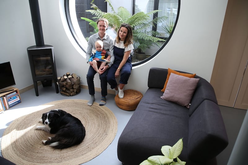 David Shannon, Susie Dillon, their daughter Olive and dog Bonnie at Fern Cottage, Shankill, Dublin. Photograph: Nick Bradshaw