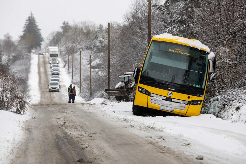 An 'Out of Service' bus stuck in a ditch on the main Ennis to Kirush road the N68. Photograph: Press 22