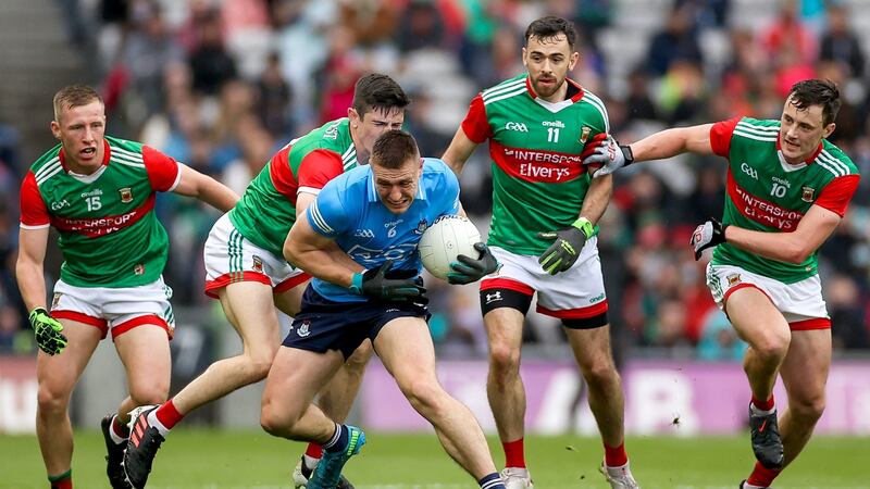 Dublin’s John Small is tackled by Conor Loftus as Ryan O’Donoghue, Kevin McLoughlin and Diarmuid O’Connor also close in during the All-Ireland football semi-final at Croke Park. Photograph: James Crombie/Inpho