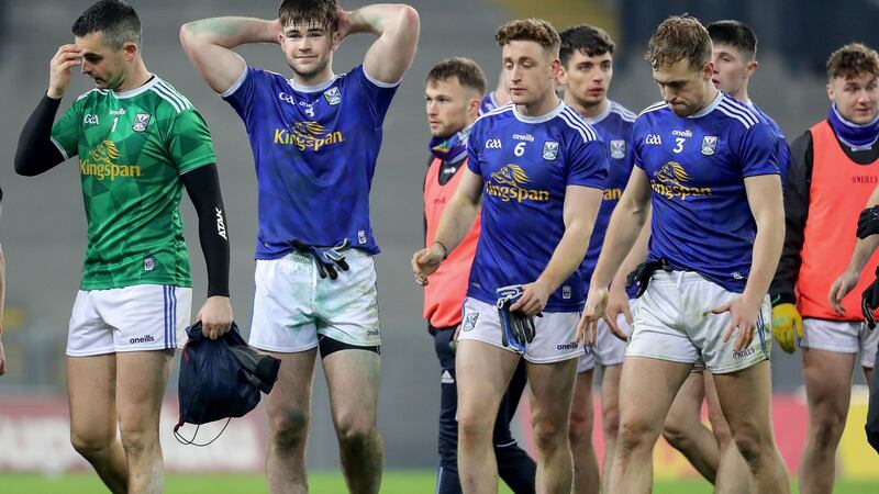 Cavan players look dejected after their side’s defeat to Dublin. Photograph: Bryan Keane/Inpho