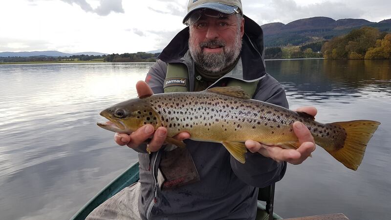 Tom Sweeney with a magnificent brown trout of 2kg at Lake Menteith, Scotland