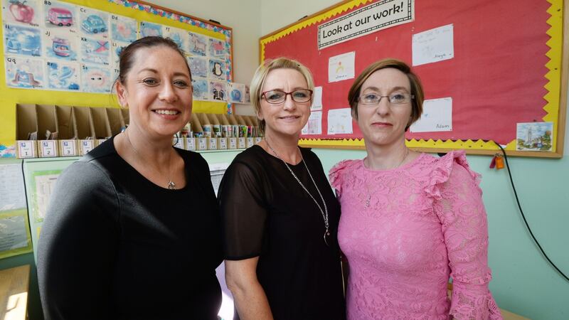 Michelle Metcalfe (left) with Sarah Eustace and June Tinsley of  Barnardos: “There is frustration that parents have to prop up an underfunded education system,” says Ms Tinsley. Photograph: Cyril Byrne