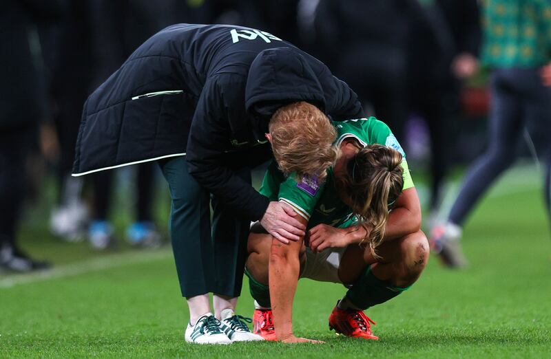 Eileen Gleeson consoles Katie McCabe after the defeat to Wales. Photograph: Ryan Byrne/Inpho 