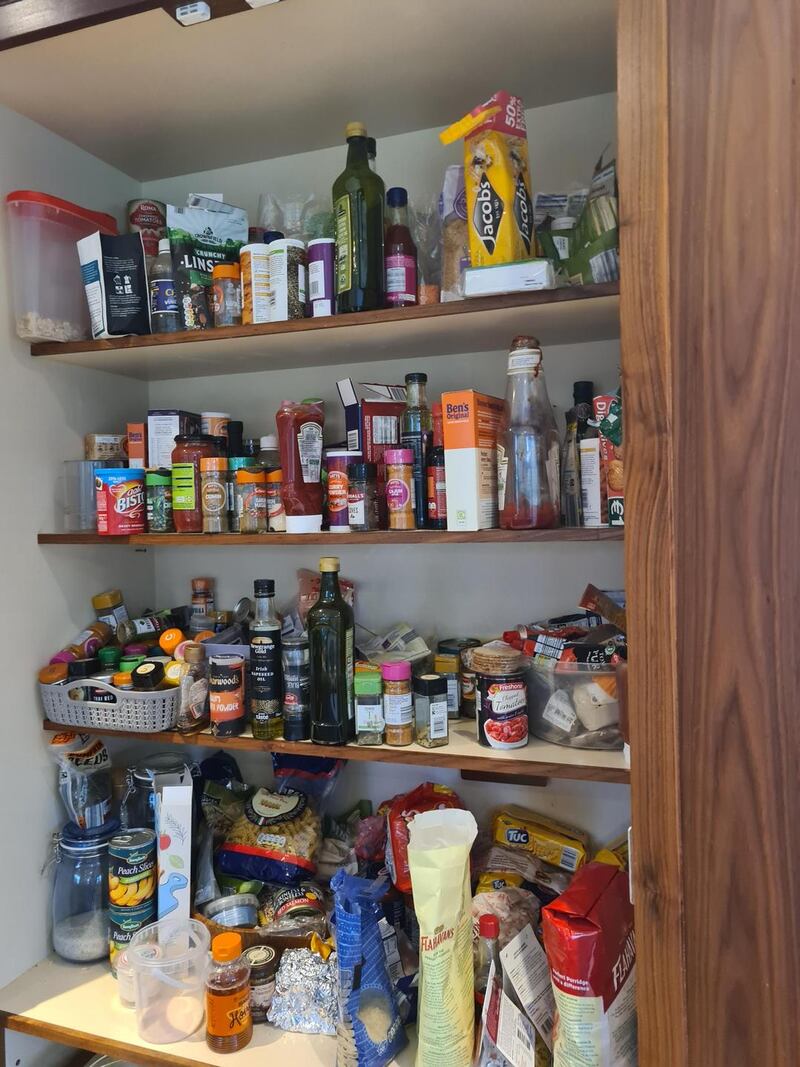 Before: Danielle Rooney was charged with bringing order to this messy pantry