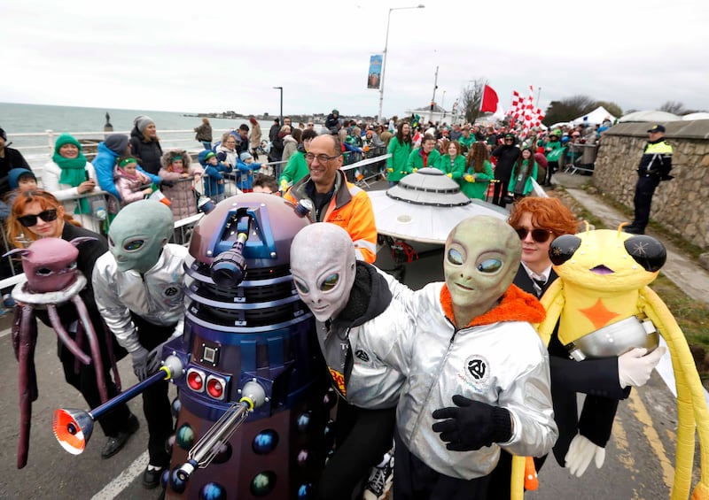 Visitors from another planet help IADT graduate Ali Kemal Ali's float of UFO and aliens during the St. Patrick’s Day parade in Dún Laoghaire. Photograph: Mark Stedman