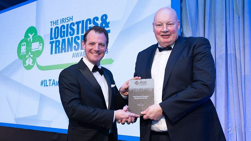 Seamus Kavanagh, Awards Judge, presents the Own Account Transport Operator of the Year award to Ken Leahy, BWG Foods.