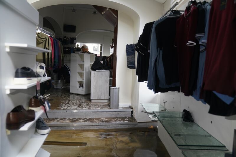 The McCartan Bros store was damaged by floodwater after the city's canal banks burst amid heavy rainfall. Photograph: Brian Lawless/PA