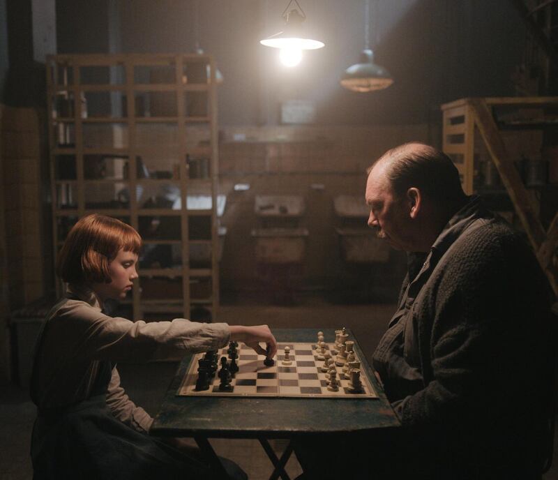 The Queen’s Gambit: Isla Johnston as youg Beth with Bill Camp as Mr Shaibel. Photograph: Netflix