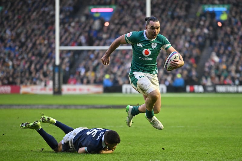 Ireland's wing James Lowe skips away from Scotland's fullback Blair Kinghorn. Photograph: Andy Buchanan/Getty