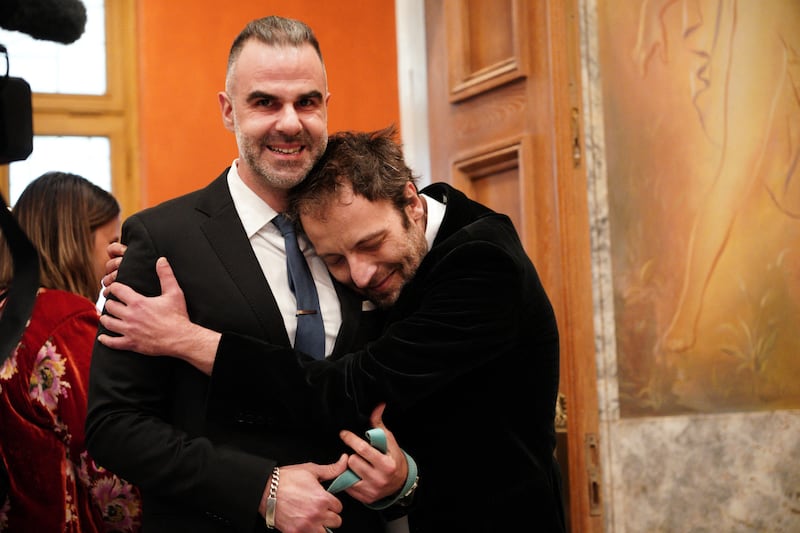 Lawyer Anastasios Samouilidis (left) and novelist Petros Hadjopoulos, the first same sex-couple to be wed in Athens, arrive at Athens City Hall, Greece. Photograph: Menelaos Myrillas/SOOC/AFP/Getty Images