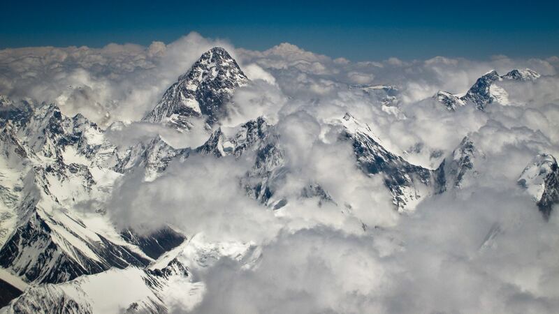 K2, the second highest mountain in the world (and highest mountain in Pakistan) with a peak elevation of 8,611 m (28,251 feet), is viewed from a Boeing 737 aircraft during an air safari.