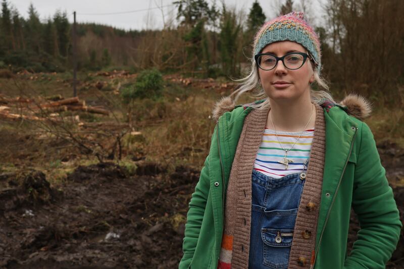 Edwina Guckian beside forestry that has been felled to free up power lines