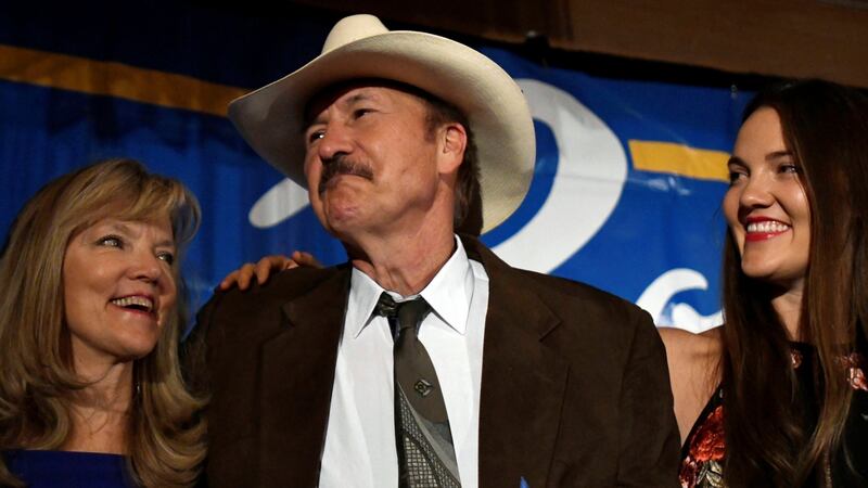 Montana Democratic congressional candidate Rob Quist stands with his wife Bonni and daughter Halladay while giving his concession speech after his electolral defeat by Republican rival Greg Gianforte. Photograph: Tommy Martino/Reuters