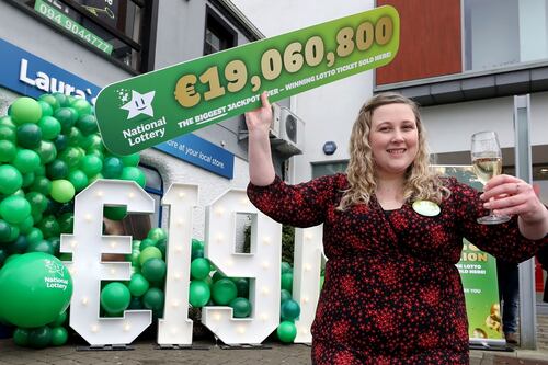 ‘It’s impossible to explain’: Winners of record €19m Lotto jackpot claim their prize