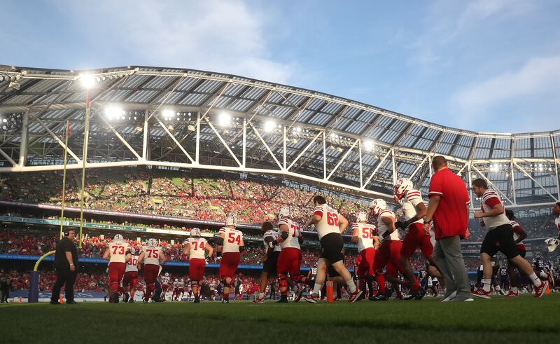 Nebraska Cornhuskers make their way on to the pitch during their Aer Lingus College Football Classic 2022 game against Northwestern Wildcats at Aviva Stadium in Dublin on August 27th, 2022. Photograph: Oisin Keniry/Getty Images