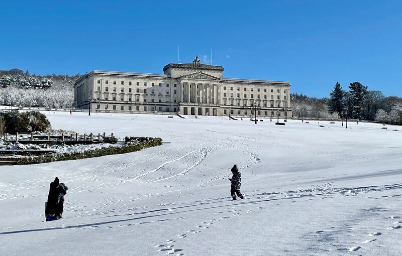 People enjoy the snow at Stormont estate in Belfast on Friday. Photograph: David Young/PA 