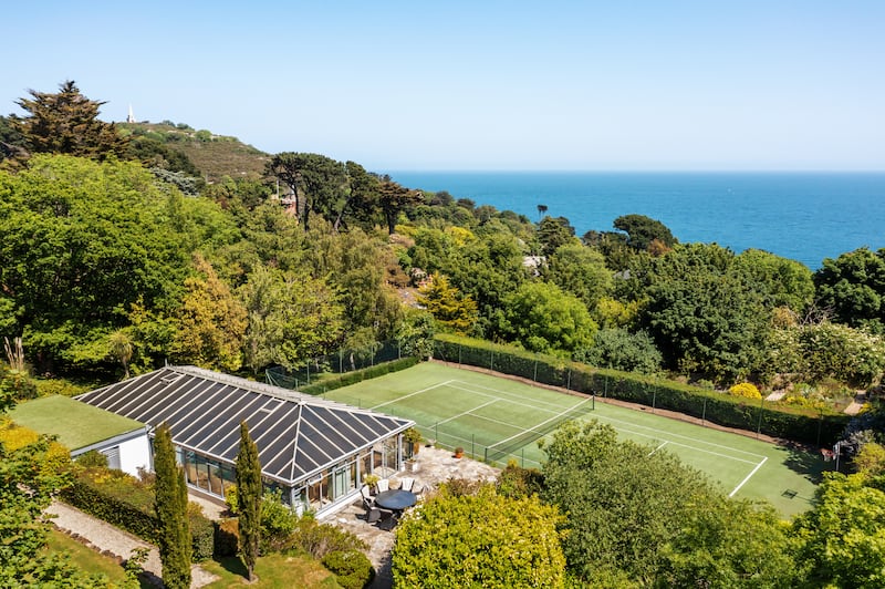 Indoor swimming pool lies in a pavilion adjacent to the tennis court