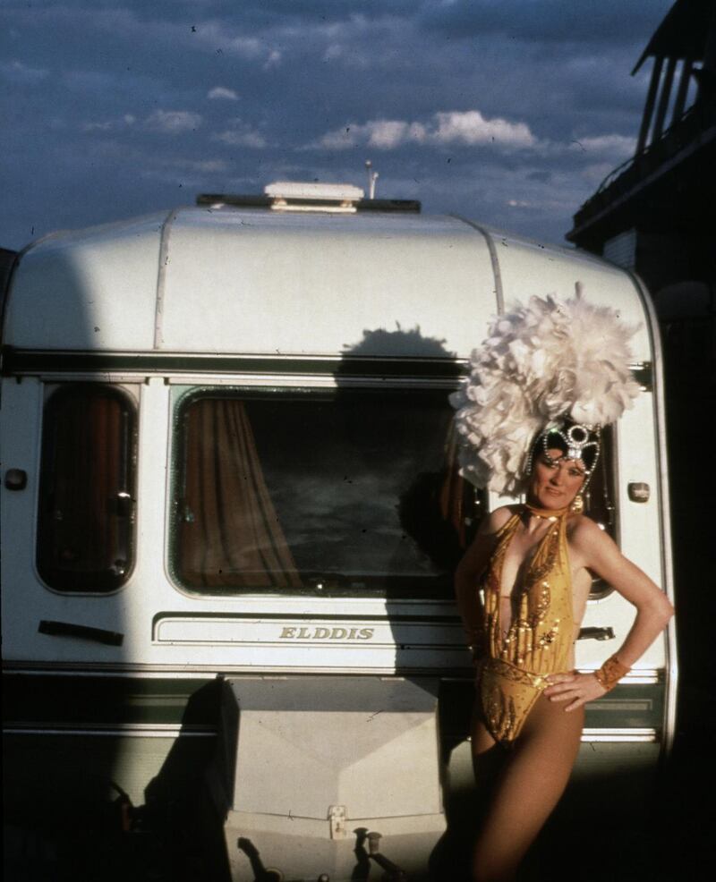 Dea Birkett in her sequins outside her circus caravan