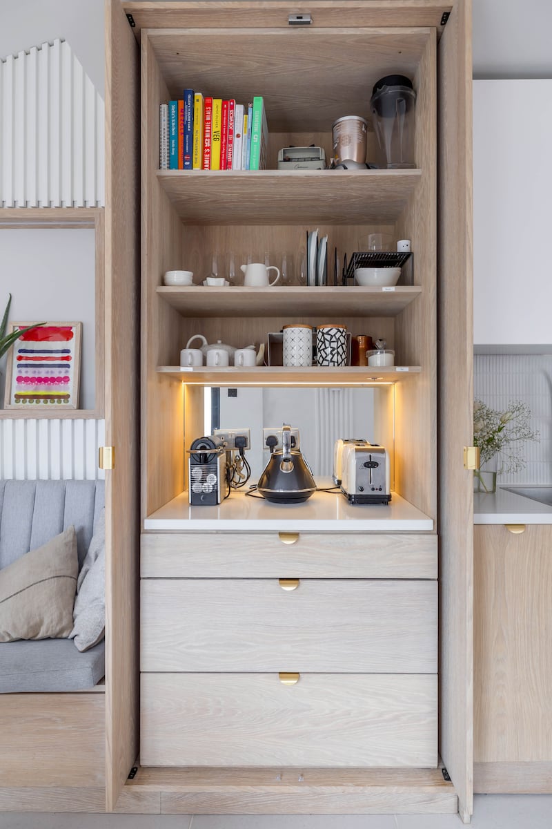 A breakfast station with bread drawer below that can all be closed off when not in use