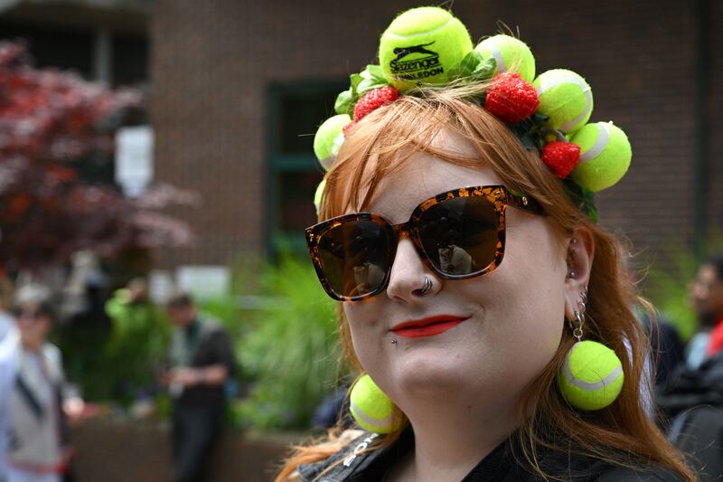 Appropriate attire at the All England Tennis Club in Wimbledon. Photograph: Sebastien Bozon/AFP via Getty Images