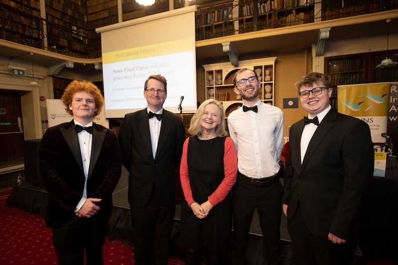 Prof Patrick Geoghegan of Trinity College Dublin, Bernice Harrison, Irish Times journalist and co-host of In the News podcast, with Owen O'Grady and Rob Fitzpatrick of UCD L&H at The Irish Times Debate semi-finals. 
Photograph: Tom Honan for The Irish Times.