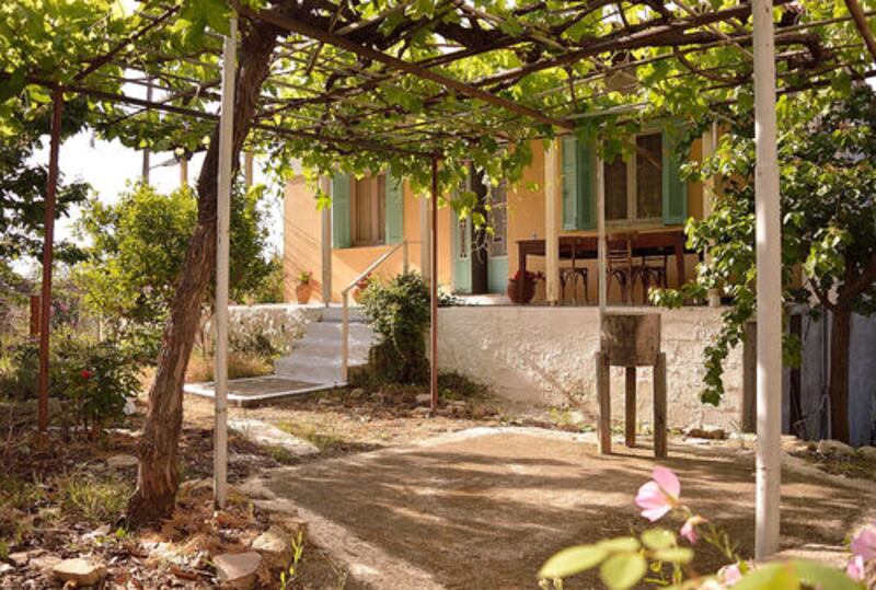 This Greek village home boasts gardens that are full of peaches, oranges, cherries and figs