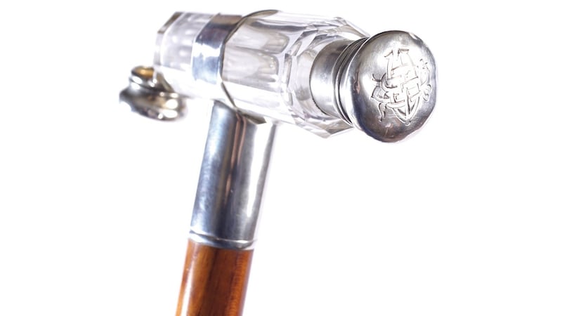 Lot 161, a 19th-century walking cane with a handle that incorporates a double-ended, silver topped scent bottle, (€500-€700 )