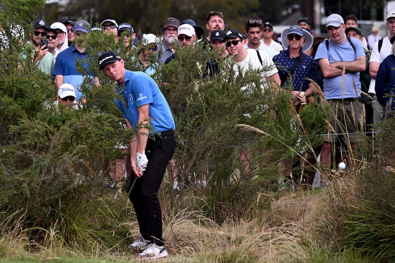 Ryggs Johnston plays out of the rough during his successful final round of the  Handa Australian Open at the Kingston Heath Golf Club in Melbourne. Photograph: William West/AFP/Getty Images