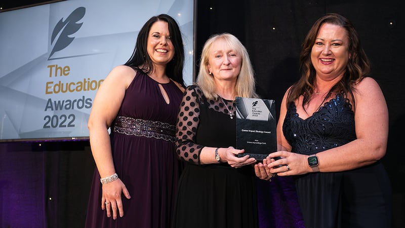 Colette Henry, Awards Judge, presents the Career Impact Strategy Award to Eleanor Donoghue and Adel Coleman, University College Cork.