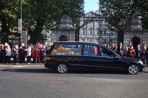 Hundreds line Dublin’s streets for Emma Mhic Mhathúna cortege