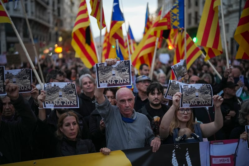 People take part in the demonstration in the Spanish city of Valencia on Saturday. Photograph: AP