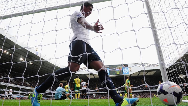 Paulinho of Tottenham celebrates after Gylfi Sigurdsson’s opening goal for theb team in Saturday’s Premeir League victory over Norwich City at   White Hart Lane . Photograph:  Jamie McDonald/Getty Images.