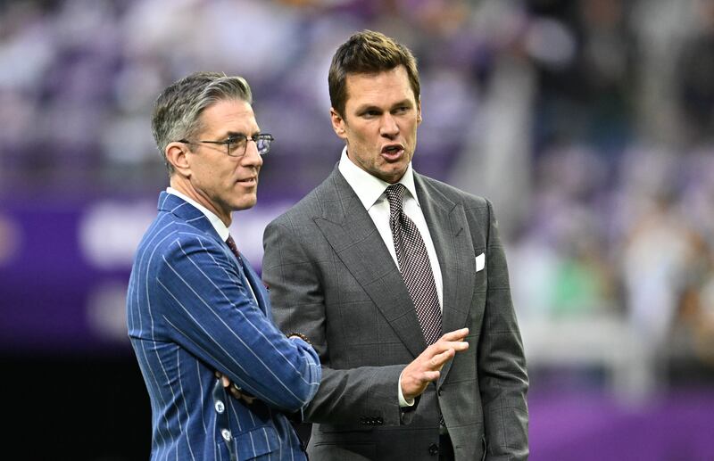 Tom Brady and broadcaster Kevin Burkhardt ahead of December's game between the Green Bay Packers and Minnesota Vikings. Photograph: Stephen Maturen/Getty Images