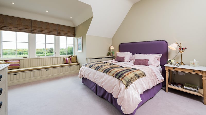 Upstairs are four cosy bedrooms, all ensuite, with gorgeous views out