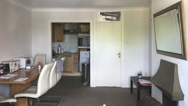 Living room and kitchen before reconfiguration. Photograph: Philip Lauterbach