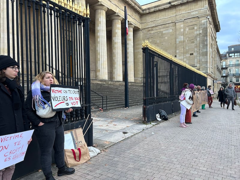 People outside the courthouse in Bordeaux show their support for the woman raped by rugby players. Photograph: Sharon Gaffney