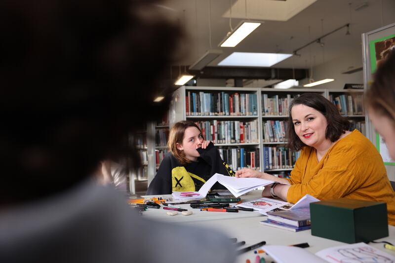 Vita Coleman, librarian at Bray Library, with teen comic club members. Photograph: Dara Mac Dónaill








