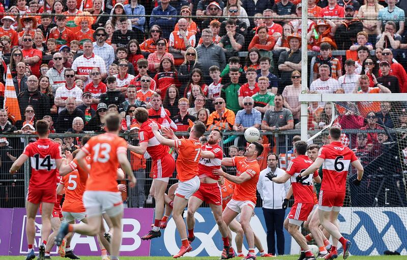 Derry's Brendan Rogers punches in to score his side’s first goal of the game. Photograph: Tom Maher/Inpho