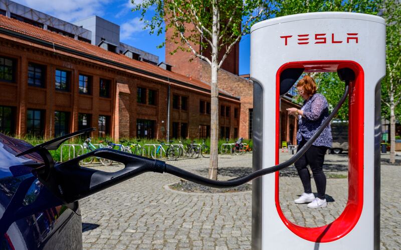 A Tesla car recharges.  Photograph: John McDougall/AFP