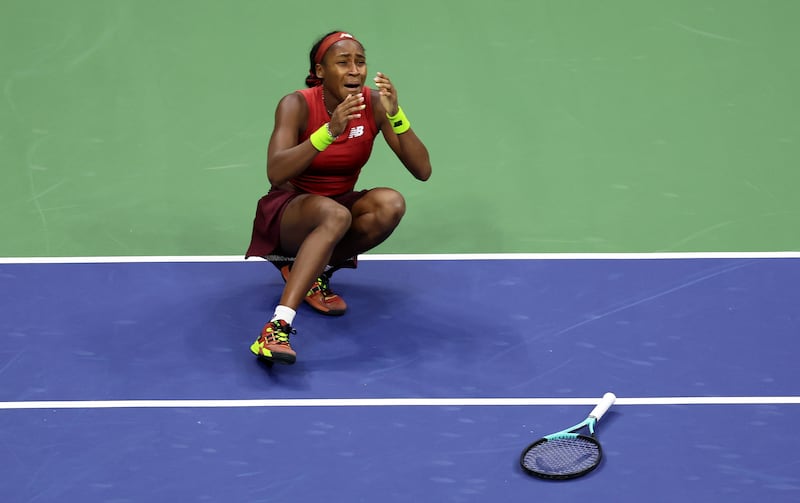 NEW YORK, NEW YORK - SEPTEMBER 09: Coco Gauff of the United States celebrates match point against Aryna Sabalenka of Belarus in their Women's Singles Final match on Day Thirteen of the 2023 US Open at the USTA Billie Jean King National Tennis Center on September 09, 2023 in the Flushing neighborhood of the Queens borough of New York City. (Photo by Clive Brunskill/Getty Images)