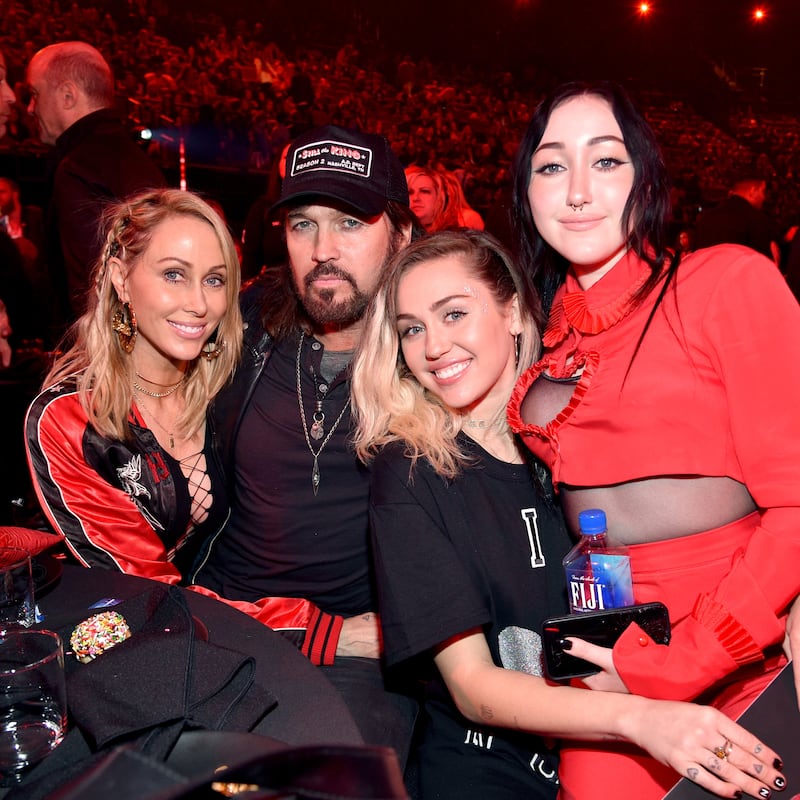 Public family: Noah Cyrus with her mother, Tish, father, Billy Ray, and sister Miley in 2017. Photograph: Kevin Mazur/Getty