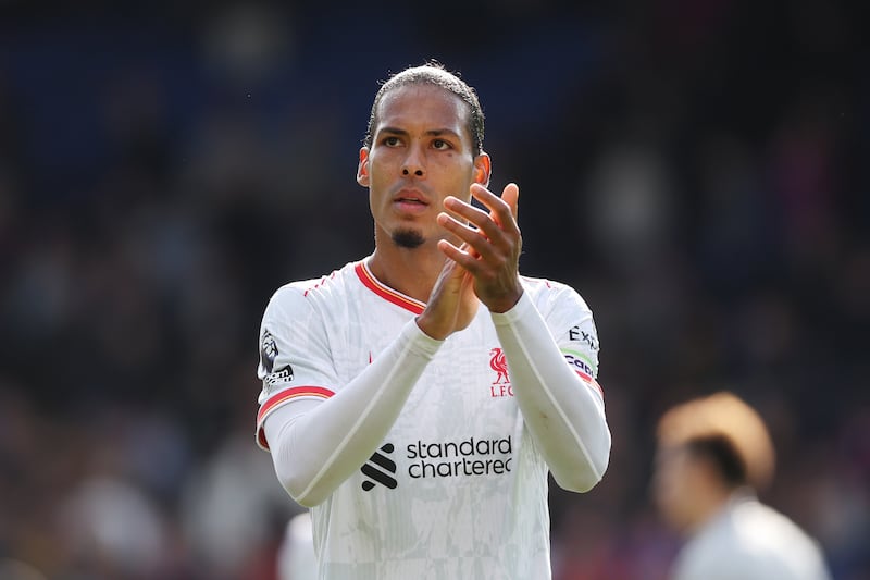 Virgil van Dijk of Liverpool applauds the fans following the team's victory over Crystal Palace at Selhurst Park. Photograph: Julian Finney/Getty Images