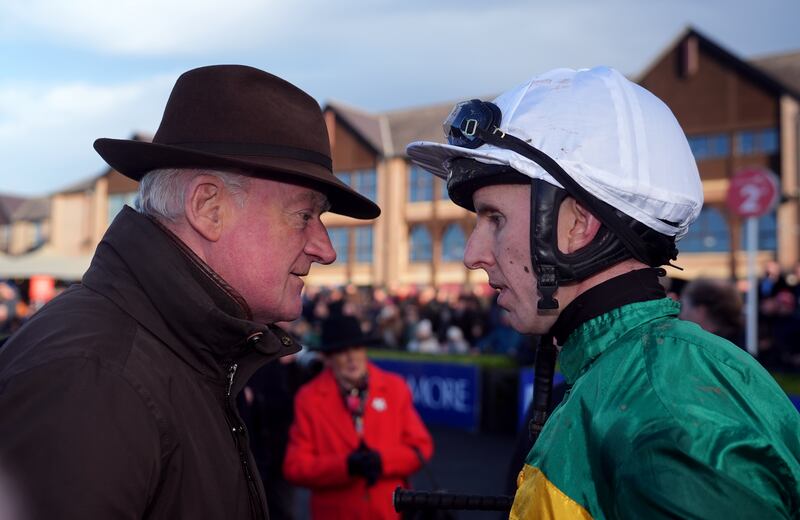 Willie Mullins and Mark Walsh after winning the John Durkan Memorial Punchestown Chase with Fact To File on Sunday. Photograph: Niall Carson/PA Wire.

