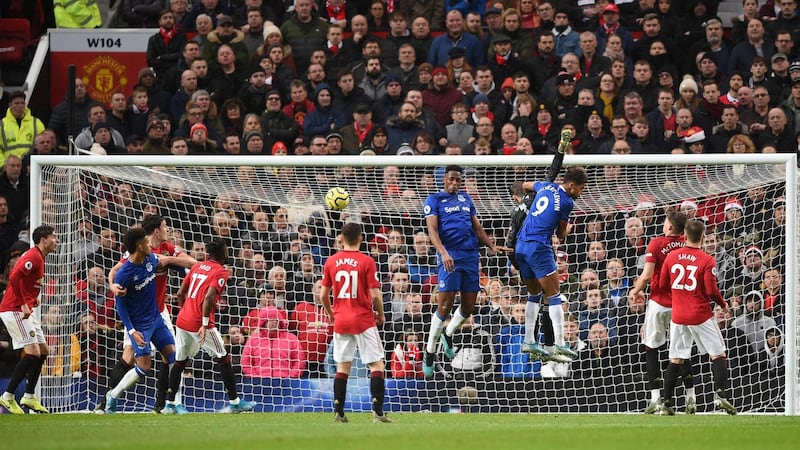 David de Gea is challenged from a corner ahead of Victor Lindelof’s own goal against Everton. Photograph: Oli Scarff/Getty/AFP