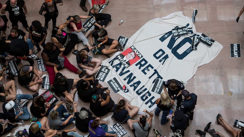 Demonstrators protest the Supreme Court nomination of judge Brett Kavanaugh in the Hart Senate Office Building in Washington on Thursday. Photograph: The New York Times