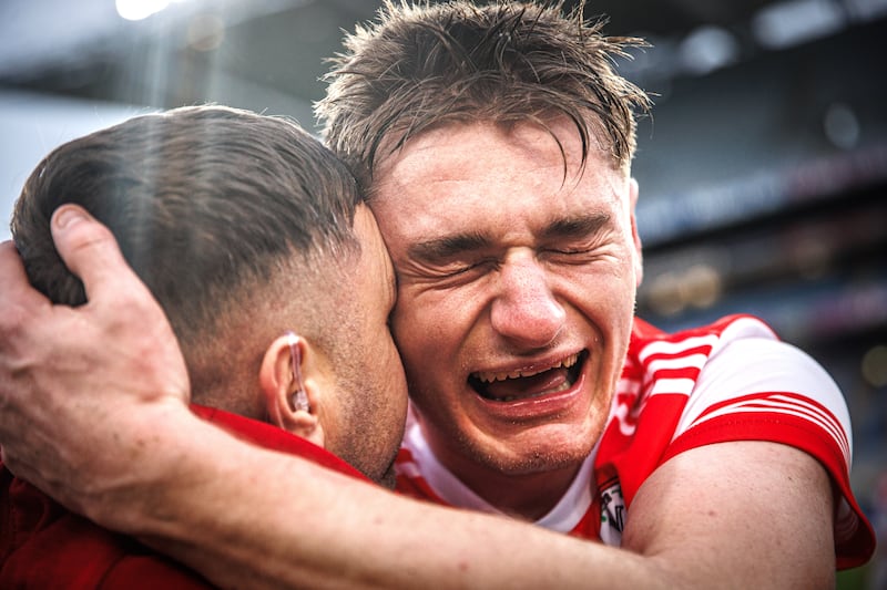 Watergrasshill's Sean Desmond celebrates winning with team physio David Lockyer after their win in the All-Ireland club IHC final against Tynagh/AbbeyDuniry. Photograph: Tom Maher/Inpho