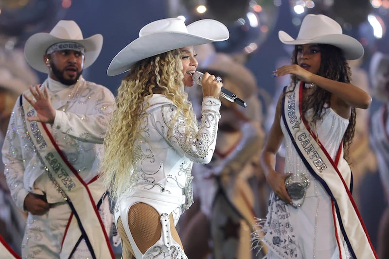 Beyoncé performs with her daughter, Blue Ivy, during the half-time show for the game between the Baltimore Ravens and the Houston Texans at NRG Stadium on Christmas Day. Photograph: Alex Slitz/Getty Images